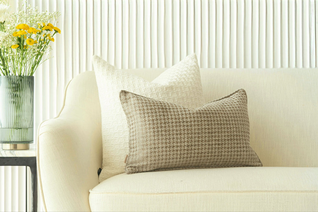 calm and sunlit corner with a cushion and a lit candle, reflecting mindful stillness.